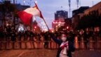 Ex-Peru president wanted in bribery probe shrugs off arrest