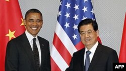 Барак Обама і Ху Цзіньтао на саміті з питань ядерної безпеки в Сеулі