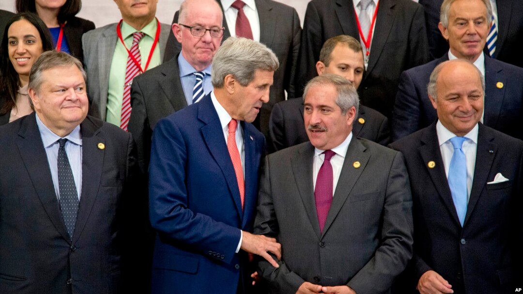 FILE - U.S. Secretary of State John Kerry talks with Jordanian Foreign Minister Nasser Judeh.
