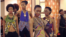 Models wearing East African designer wear prepare for a runway show in Kampala. May 17, 2014. (Hilary Heuler / VOA News)