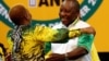 Deputy president of South Africa Cyril Ramaphosa greets an ANC member during the 54th National Conference of the ruling African National Congress (ANC) at the Nasrec Expo Center in Johannesburg, South Africa, Dec. 18, 2017.