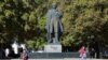 Pedestrians walk in Luhansk