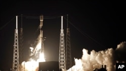 FILE - A Falcon 9 SpaceX rocket, with a payload of 60 satellites for SpaceX's Starlink broadband network, lifts off from Space Launch Complex 40 at the Cape Canaveral Air Force Station in Cape Canaveral, Florida. 