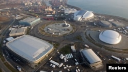 An aerial view from a helicopter shows the Olympic Park in the Adler district of the Black Sea resort city of Sochi.