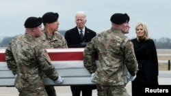 U.S. President Joe Biden and first lady Jill Biden attend the dignified transfer of the remains of Army Reserve Sergeants William Rivers, Kennedy Sanders and Breonna Moffett, who were killed in Jordan, at Dover Air Force Base in Dover, Delaware, on Feb. 2, 2024.