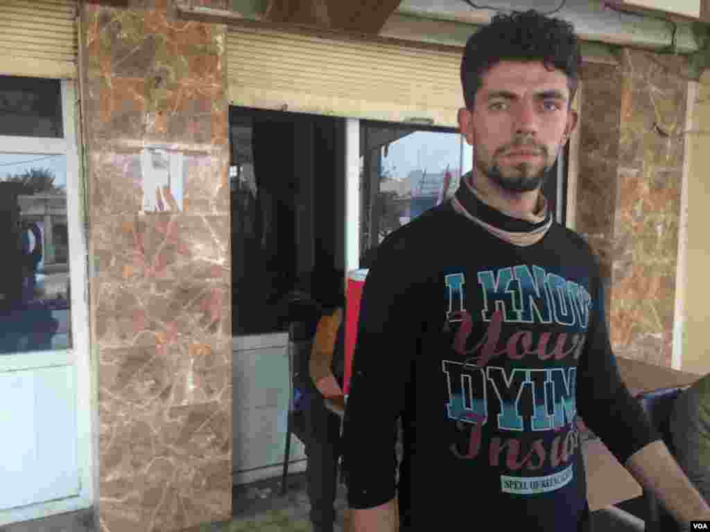 Obayda left six months ago, returning only after IS had been driven from town. Life under IS in Qayyarah, Iraq, he says, was becoming more dangerous as Iraqi forces grew closer, Oct. 24, 2016. (H. Murdock/VOA)
