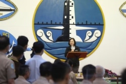FILE - Taiwan's President Tsai Ing-wen delivers a speech during a visit to Zuoying navy base in Kaohsiung, southern Taiwan, Sept. 26, 2020.