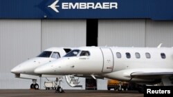 Private jets are seen at the Embraer headquarters in Sao Jose dos Campos, Brazil, May 14, 2013.