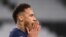 Paris Saint-Germain's Brazilian forward Neymar reacts