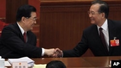 胡錦濤與溫家寶3月5日在中國人大開幕式上