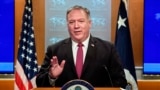 Secretary of State Mike Pompeo speaks during a news conference at the State Department in Washington, Wednesday, Oct. 21, 2020. (Nicholas Kamm/Pool via AP)