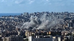 Asap membubung dari kawasan permukiman di selatan Kota Beirut, Lebanon, setelah serangan Israel pada Jumat, 20 September 2024. (Foto: AFP)