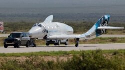 Virgin Galactic's passenger rocket plane VSS Unity is towed to a hangar after reaching the edge of space, at Spaceport America, near Truth or Consequences, New Mexico, July 11, 2021.