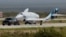 Virgin Galactic's passenger rocket plane VSS Unity is towed to a hangar after reaching the edge of space, at Spaceport America, near Truth or Consequences, New Mexico, July 11, 2021.