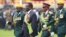 FILE: Emmerson Mnangagwa, second left, with Army General Constantino Chiwenga, second right, inspects the military parade after being sworn in as President at the presidential inauguration ceremony in the capital Harare, Zimbabwe Friday, Nov. 24, 2017.
