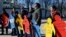 FILE - Activists take part in a flashmob to highlight human rights violations against Tatars living in Russia-annexed, in Kyiv, Ukraine, March 16, 2016.