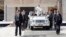 Pope Francis waves as he leaves after leading the weekly audience in Saint Peter's Square at the Vatican, Oct. 2, 2013.