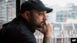 Christian Picciolini, founder of the group Life After Hate, poses for a photograph in his Chicago home, Jan. 9, 2017. Picciolini, a former skinhead, is an activist combating what many see as a surge in white nationalism across the United States. 