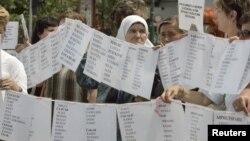 Bosnian Muslim women from Visegrad hold a peaceful protest of the U.N. war crimes tribunal's failure to include counts of rape in indictments against Bosnian Serb cousins Milan and Sredoje Lukic, Sarajevo, July 18, 2008.