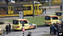 Ambulances are seen next to a tram after a shooting in Utrecht, Netherlands, March 18, 2019. 