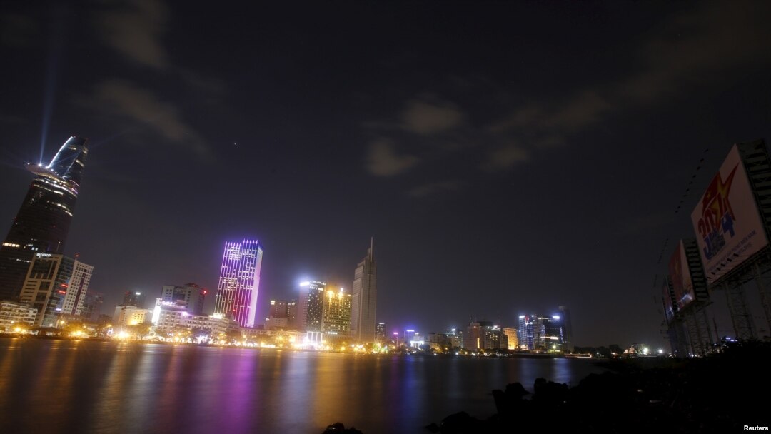 FILE - New buildings are seen along the Saigon river in southern Ho Chi Minh City (formerly Saigon City), Vietnam, April 26, 2015.