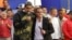 FILE - Venezuela's President Nicolas Maduro, left, and Alex Saab embrace during an event marking the anniversary of the 1958 coup that overthrew dictator Marcos Perez Jimenez, in Caracas, Venezuela, Jan. 23, 2024. Maduro has appointed Saab to his Cabinet.