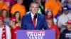 FILE - North Dakota Governor Doug Burgum speaks during the final campaign rally for then-presidential nominee Donald Trump before Election Day at Van Andel Arena in Grand Rapids, Michigan, Nov. 4, 2024. 