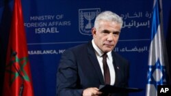 Menlu Israel Yair Lapid mengecam laporan Amnesty International.