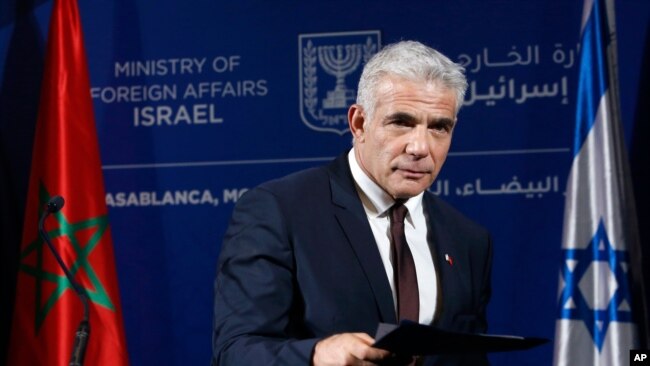 Menlu Israel Yair Lapid mengecam laporan Amnesty International.
