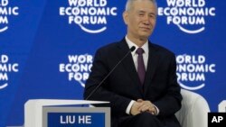 Liu He, member of the Political Bureau of CPC Central Committee, listens during the annual meeting of the World Economic Forum in Davos, Switzerland, Jan. 24, 2018. 