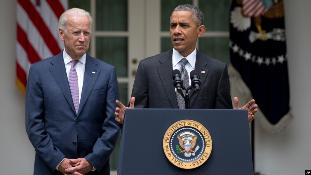 President Barack Obama, accompanied by Vice President Joe Biden, speaks in the Rose Garden of the White House, June 25, 2015, in Washington, after the U.S. Supreme Court upheld the subsidies for customers in states that do not operate their own exchanges 