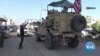 Angry Kurds Hurl Potatoes and Insults at Retreating US Military Convoys