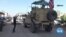 Angry Kurds Hurl Potatoes and Insults at Retreating US Military Convoys