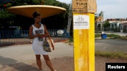 A placard opposing gay marriage is seen on a pole in Havana, Cuba, July 19, 2018.