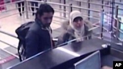 Security camera video footage obtained by Haberturk television on Jan. 12, 2015, shows Hayat Boumeddiene and a male travel companion arriving at Istanbul's Sabiha Gokcen airport on Jan. 2, 2015.