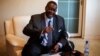 Malawian presidential candidate Peter Mutharika, brother of the late president Bingu wa Mutharika, gestures during a press conference at his residence in Blantyre, Malawi, May 22, 2014.