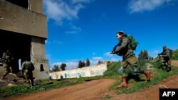 이스라엘 군인들이 15일 북부 국경 골란고원에서 전투태세 훈련을 했다.
