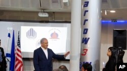 Israeli PM Benjamin Netanyahu speaks during a visit to the Israel Aerospace Industries (IAI) MLM Division plant in Be'er Ya'akov, Israel, Tuesday, Jan. 22, 2019.