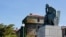 The statue of British colonialist Cecil John Rhodes at the University of Cape Town in South Africa will be taken away and stored, pending a decision on what will ultimately be done with it.