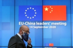 European Council President Charles Michel arrives for an online press conference at the European Council building in Brussels, Sept. 14, 2020.