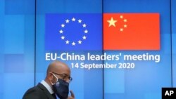 FILE - European Council President Charles Michel arrives for an online press conference at the European Council building in Brussels, Sept. 14, 2020.