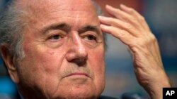 FIFA President Sepp Blatter talks about the organization and infrastructure of the upcoming World Cup during a press conference in Sao Paulo, Brazil, June 5, 2014.