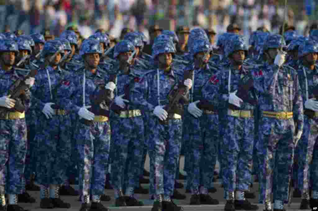 Myanmar Navy officers stand in a parade during a ceremony to mark Myanmar's 67th anniversary of Independence Day in Naypyitaw, Myanmar, Sunday, Jan. 4, 2015. (AP Photo/Gemunu Amarasinghe)