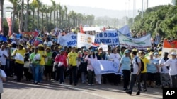 In Durban, South Africa, midwives and their supporters hold a march, June20, 2011. The march was held in conjunction with the release of a new report calling for 112,000 additional midwives.