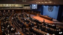 Delegates meet for a United Nations climate change conference in Bangkok, Thailand, Sept 9, 2018. 