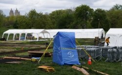 A field hospital set up in New York City's Central Park, run by nonprofit Samaritan's Purse, to treat coronavirus patients is dismantled, May 11, 2020.