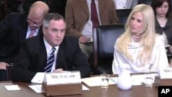 Tareq (L) and Michaele Salahi appear before the House Committee on Homeland Security, 20 Jan 2010