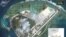 Satellite imagery analysis by geopolitical intelligence firm Stratfor shows overall land, building and military expansion by China on Woody Island in the South China Sea. (Courtesy of Stratfor)