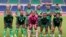 FILE - Players of Zambia line up for a photo before a women's soccer match against Brazil at the 2020 Summer Olympics, Tuesday, July 27, 2021, in Saitama, Japan.