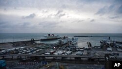 FILE - A general view of the trucks at the Port of Dover, waiting for boarding on a ferry in Dover, England, Dec. 24, 2020. 